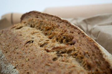 coarse crust of bread. sliced ​​bread on a cutting board