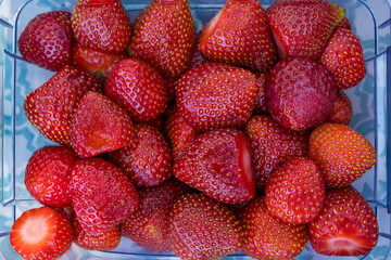 Large, clean and prepared for eating farmed, eco-friendly strawberries