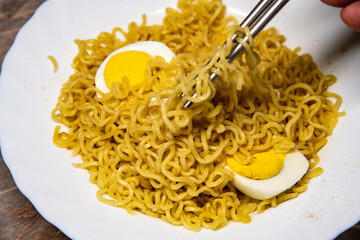 Instant noodle
with boiled eggs, asia food recipe, ramen soup with eggs.