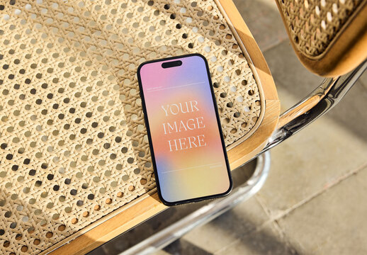 Mockup Of Customized Smartphone On Chair