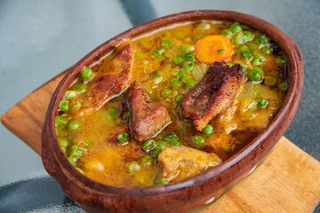 Meat with healthy green peas, preparing food