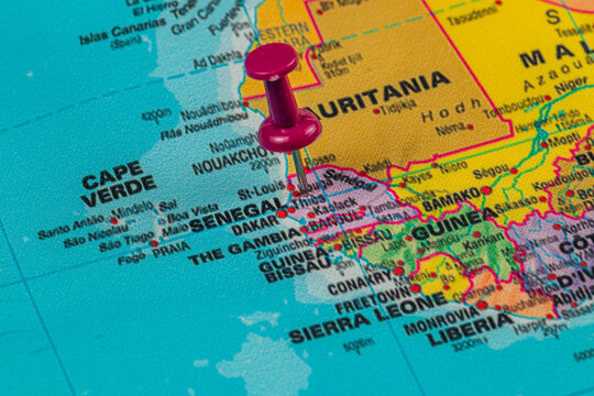 Lviv Ukraine 05.14.25 Pinpointing Dakar on a colorful map of West Africa
