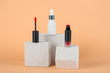 Plastic white tube for cream or lotion. Skin care or sunscreen cosmetic with stylish props on cream background.