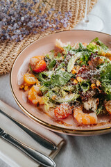 Salad with dressing and fresh vegetables