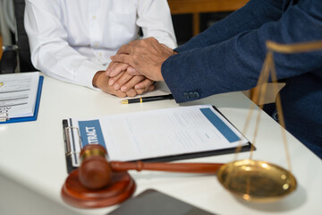 business lawyer meeting working hard about legal legislation in courtroom to help their customer.