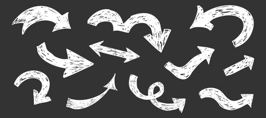 Thick white arrow crayon or chalk drawing sketch grunge textured on blackboard set. Different directions simple curve shape. Pencil, marker, pastel scribble