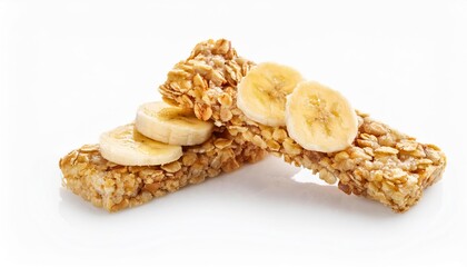 Two muesli bars with banana slices on white background