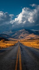 Toward the horizon lies a long, straight asphalt road.