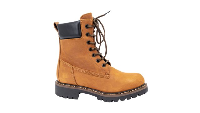 Isolated brown leather cowboy boots, a classic footwear fashion object