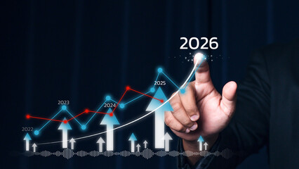 Businessman draws increase arrow graph corporate future growth year 2022 to 2026. Planning.
