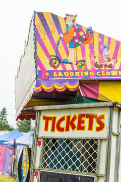 A brightly coloured ticket booth at an amusement park