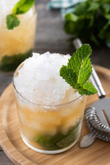Classic Mint Julep Cocktail on wooden table