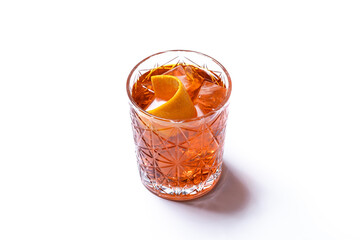 Americano cocktail garnished with twist orange isolated on white background