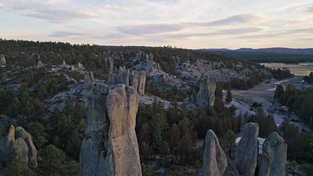 Rock spires and forested hills in Valle de los Monjes at sunset, Creel, Chihuahua, Mexico