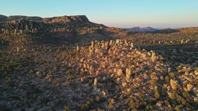 Rock formations glowing in warm light, Valle de los Monjes, Creel, Chihuahua, Mexico