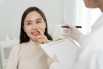 plastic surgery, beauty asian smile and happy after surgery, surgical procedure that involve...
