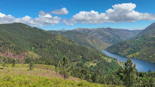 Panning panoramic view over the mountains and valley in the Peneda Geres National Park of Portugal.