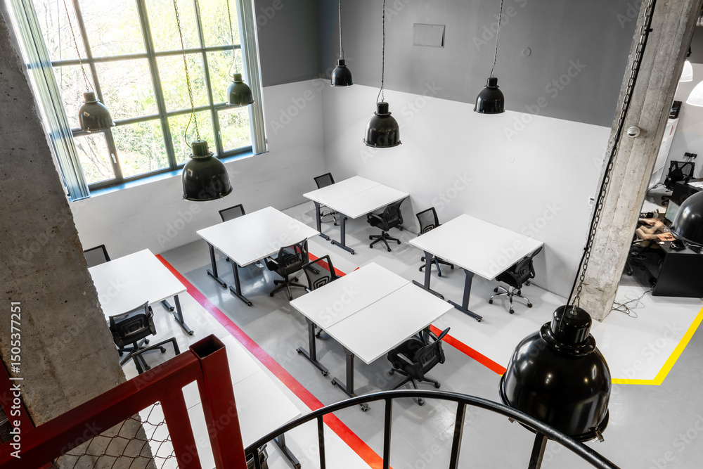 Poster modern coworking space with large windows and minimalist design in a busy urban setting