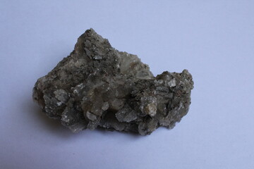 gypsum, detailed macro shot of soft mineral calcium sulfate. Gypsum isolated on a white background 
