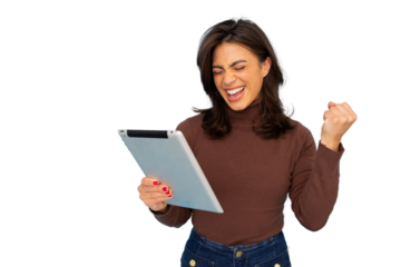 Enthusiastic woman celebrating with digital tablet, raising triumphant fist, expressing workplace achievement against neutral background