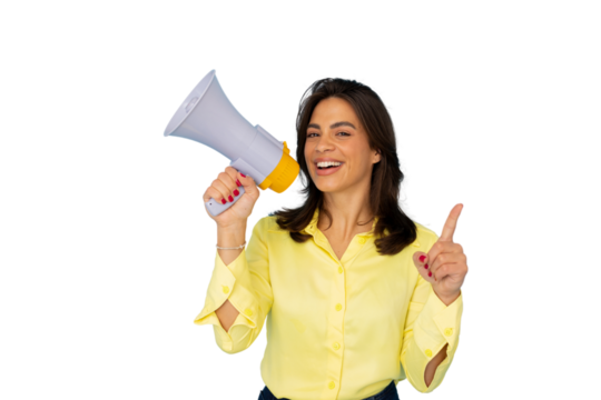Female professional shouting through megaphone, gesturing upward with energetic smile against isolated white backdrop