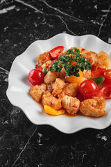 Salad with dressing and fresh vegetables