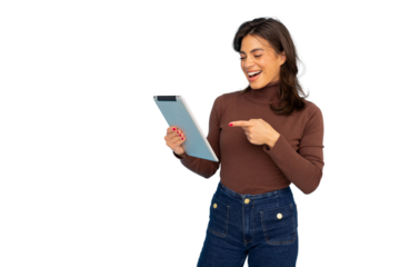Cheerful woman pointing and laughing while holding digital tablet, expressing technological joy against transparent backdrop