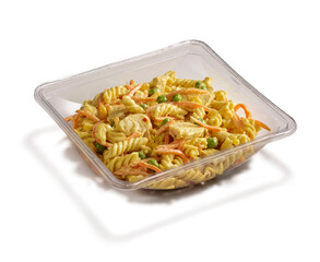 Chicken pasta salad with carrots and peas in a clear container