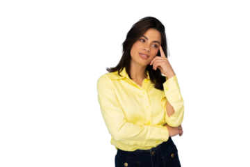 Businesswoman in yellow shirt pondering creative solution, touching forehead with index finger