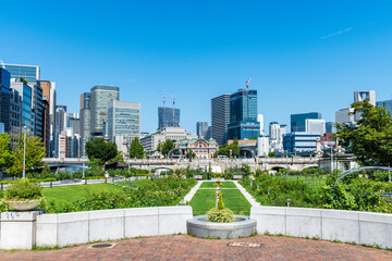 Nakanoshima Rose Garden and Osaka cityscape with Skyline and office building and downtown of Osaka city, Japan