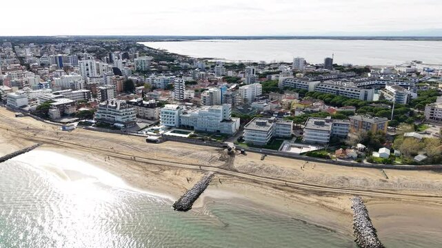 Aerial view of Lignano Sabbiadoro citi in Italy between Mariano lagoon and Adriatic Sea