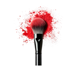 A makeup brush with red bristles is on top of a pile of red powder