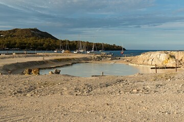 View of Thermal Mud Baths at Sunset on Vulcano Island. Aeolian (Lipari) Islands. Italy. Europe.