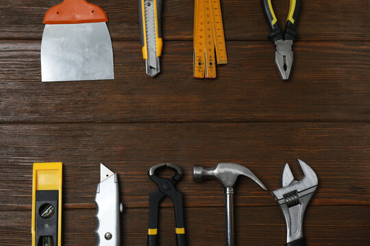 Set of tools for repair. Hammer pliers screwdriver angle pliers adjustable wrench. Many tools 