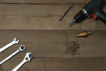 Set of tools for repair. Hammer pliers screwdriver angle pliers adjustable wrench. Many tools 