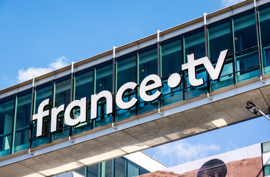 Paris, France - April 28, 2025: Close-up view of the logo of France T&eacute;l&eacute;visions, the French national public television broadcaster, on the facade of its headquarters.