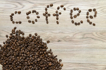 Coffee beans arranged to spell 