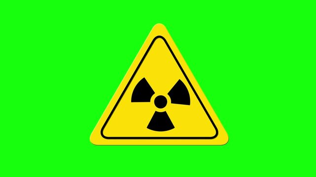 Radiation warning symbol in yellow and black triangle on green screen and white background. Atomic radioactive nuclear sign
