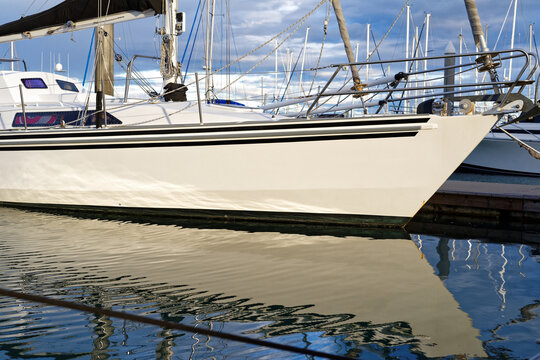 Yacht sail boat anchored at Hervey Bay Marina in tranquil waters