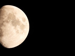 full moon over black