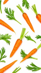 Fresh carrots with green tops isolated on white, minimalistic food composition