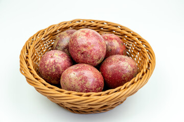 Fresh passion fruits in the fruit basket