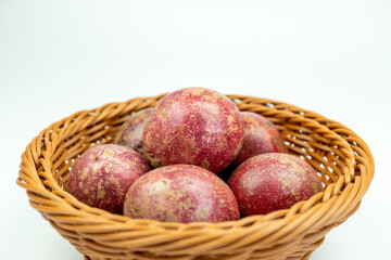 Fresh passion fruits in the fruit basket