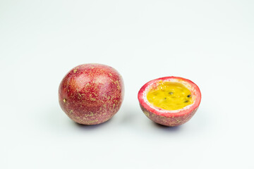 Fresh passion fruit on a solid-color background