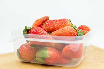 Fresh strawberries in the transparent box