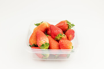 Fresh strawberries in the transparent box