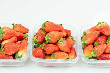 Fresh strawberries in the transparent box