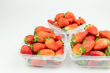 Fresh strawberries in the transparent box