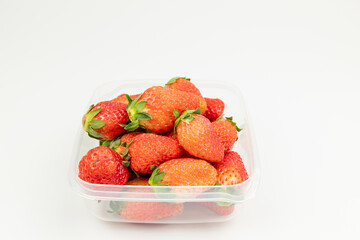 Fresh strawberries in the transparent box