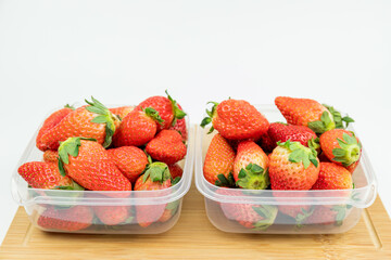 Fresh strawberries in the transparent box